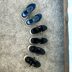 3 pairs of Brooks shoes
